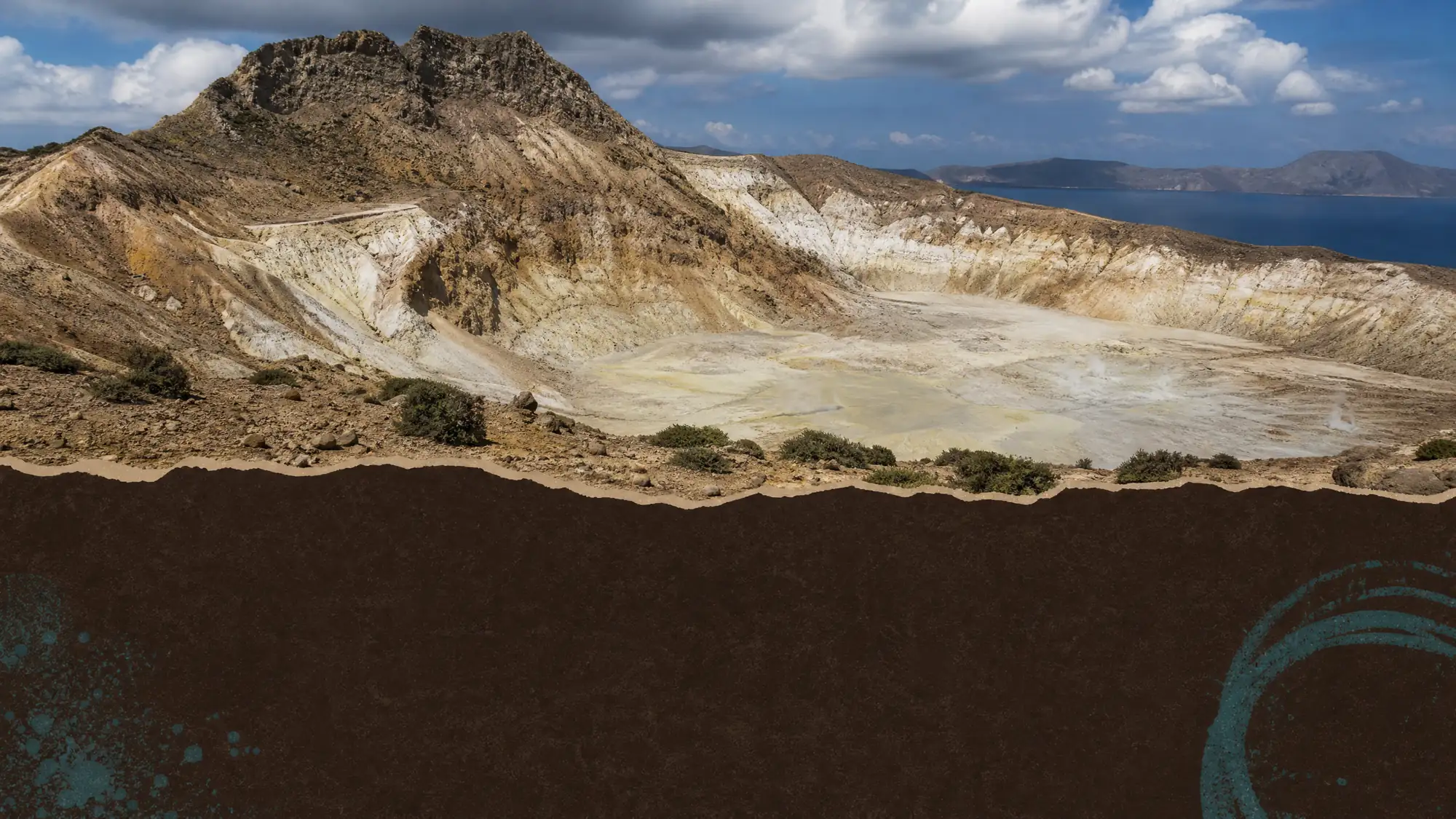 Walk across a dormant hydrothermal crater. Boiling mud, sulfur crystals, and 100°C fumaroles fill the 300-meter-wide Stefanos Crater.